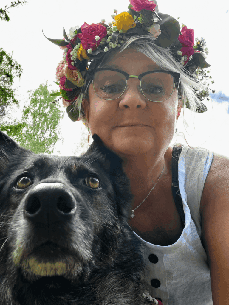 Carina with Chili, a much-loved family dog. This is perhaps the photograph that best reflects Carina as herself: happiest with an animal close beside her.