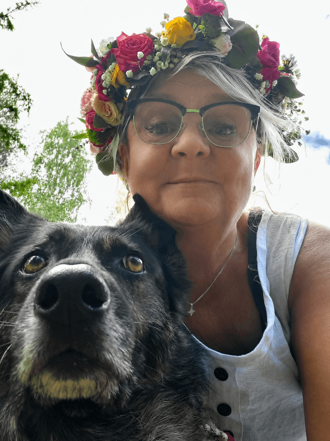 Carina with Chili, a much-loved family dog. This is perhaps the photograph that best reflects Carina as herself: happiest with an animal close beside her.